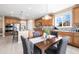 Island kitchen with stainless steel appliances and ample cabinet space at 10443 Skyreach Way, Highlands Ranch, CO 80126