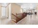 Stairway overlooking the living room and fireplace at 10443 Skyreach Way, Highlands Ranch, CO 80126