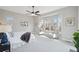 Bright, spacious main bedroom featuring a bay window and contemporary artwork at 14642 Sorrel Dr, Broomfield, CO 80023