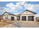 Charming ranch-style home with three-car garage, stone accents and solar panels at 14642 Sorrel Dr, Broomfield, CO 80023