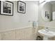 Charming powder room featuring updated fixtures and tile accents at 14642 Sorrel Dr, Broomfield, CO 80023