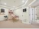 Finished basement features recessed lighting, a sports area, and an open doorway to another room at 7902 E 49Th Pl, Denver, CO 80238