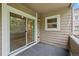 Balcony features sliding glass doors for easy access and natural light at 8378 S Upham Way # B205, Littleton, CO 80128