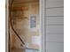 Electrical panel and shelving are visible in the outdoor storage area at 8378 S Upham Way # B205, Littleton, CO 80128