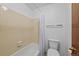 This bathroom has a white bathtub, tiled shower, and white toilet at 8378 S Upham Way # B205, Littleton, CO 80128