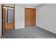 Bedroom features carpet, natural light, and closet at 8378 S Upham Way # B205, Littleton, CO 80128