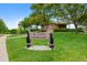A recreation center is surrounded by green grass and mature trees at 8378 S Upham Way # B205, Littleton, CO 80128