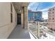 Private balcony overlooking city views and construction at 290 W 12Th Ave # 401, Denver, CO 80204