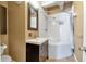 Bathroom with corner tub, shower, and modern vanity at 290 W 12Th Ave # 401, Denver, CO 80204