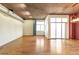 Open concept living space with hardwood floors and exposed ductwork at 290 W 12Th Ave # 401, Denver, CO 80204