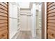 Large walk-in closet with ample shelving and hanging space at 290 W 12Th Ave # 401, Denver, CO 80204