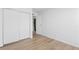 Bedroom with closet and laminate flooring at 3663 S Sheridan Blvd # I8, Denver, CO 80235
