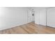 Bright bedroom with sliding door closet and laminate floor at 3663 S Sheridan Blvd # I8, Denver, CO 80235