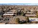 Comprehensive aerial view of the community, highlighting amenities like the playground and basketball court at 3663 S Sheridan Blvd # I8, Denver, CO 80235