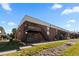 Attractive exterior of a multi-unit building with stairs and landscaping at 3663 S Sheridan Blvd # I8, Denver, CO 80235