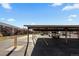 Reserved parking area with covered carport spaces at 3663 S Sheridan Blvd # I8, Denver, CO 80235