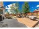 Backyard featuring a wooden deck, a fire pit and a fenced in yard at 16257 E 105Th Cir, Commerce City, CO 80022