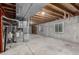 Unfinished basement with exposed ceiling and concrete walls at 16257 E 105Th Cir, Commerce City, CO 80022