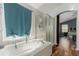 Relaxing bathroom with a soaking tub and a separate glass shower at 16257 E 105Th Cir, Commerce City, CO 80022