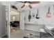 Bedroom with guitars hanging on the wall and an open door leading to the living room at 16257 E 105Th Cir, Commerce City, CO 80022