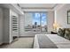 Light-filled bedroom with a bright window and city view at 2001 Lincoln St # 1811, Denver, CO 80202