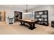 Game room featuring a billiard table under pendant lighting, plus shelving at 9629 Silent Hills Ln, Lone Tree, CO 80124