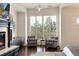 Bright sitting area in the main bedroom, featuring large windows offering abundant natural light at 9629 Silent Hills Ln, Lone Tree, CO 80124