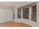 Bedroom featuring a bay window, closet and hardwood floors at 18577 E Whitaker Cir # C, Aurora, CO 80015