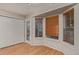 Bedroom featuring a bay window, closet and hardwood floors at 18577 E Whitaker Cir # C, Aurora, CO 80015