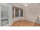 Bright breakfast nook with a bay window and hardwood floors at 18577 E Whitaker Cir # C, Aurora, CO 80015