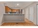 Kitchen with breakfast bar and ample cabinet space at 18577 E Whitaker Cir # C, Aurora, CO 80015