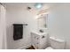 Basement bathroom with a white vanity and updated fixtures at 2808 S Fundy St, Aurora, CO 80013