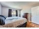 King bedroom with wood floors and ample closet space at 2808 S Fundy St, Aurora, CO 80013