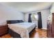 Spacious bedroom with king-size bed and wood floors at 2808 S Fundy St, Aurora, CO 80013