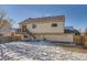 Back exterior view showing a deck and yard at 2808 S Fundy St, Aurora, CO 80013