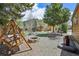 Charming backyard with swing set, fire pit, and mountain views surrounded by cabins at 85 Revett Dr # 40, Breckenridge, CO 80424