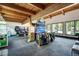 Inviting game room with vaulted wood ceilings, offering various arcade games and a cozy atmosphere at 85 Revett Dr # 40, Breckenridge, CO 80424