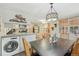 Open kitchen and dining area with modern appliances, granite counters, and stylish decor at 85 Revett Dr # 40, Breckenridge, CO 80424