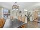 Open-concept kitchen with dining area featuring modern appliances and natural light at 85 Revett Dr # 40, Breckenridge, CO 80424
