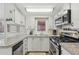 Well-equipped kitchen with granite counters, stainless steel appliances, and ample cabinet space at 85 Revett Dr # 40, Breckenridge, CO 80424
