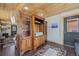 Living room with wood-look floors, storage unit, and decor for a relaxed atmosphere at 85 Revett Dr # 40, Breckenridge, CO 80424