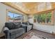 Bright living room featuring wood-look floors, large windows, and comfortable seating at 85 Revett Dr # 40, Breckenridge, CO 80424