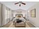 Spacious bedroom with vaulted ceilings, large windows, and neutral decor for a relaxing atmosphere at 7422 E 7Th Ave # 14, Denver, CO 80230