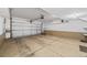 Large, clean garage with ample space and high ceilings for storage and parking at 7422 E 7Th Ave # 14, Denver, CO 80230