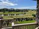 Deck overlooking pond and walking paths at 11898 Discovery Cir, Parker, CO 80138