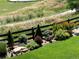 Landscaped backyard with lush greenery and fence at 11898 Discovery Cir, Parker, CO 80138