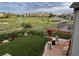 Landscaped backyard with patio and neighborhood views at 11898 Discovery Cir, Parker, CO 80138