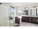 Elegant bathroom with double vanity, soaking tub, and walk-in shower at 11898 Discovery Cir, Parker, CO 80138