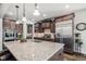 Modern kitchen features granite countertops and stainless steel appliances at 11898 Discovery Cir, Parker, CO 80138