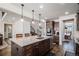 Kitchen island with granite countertops and stainless steel appliances at 11898 Discovery Cir, Parker, CO 80138